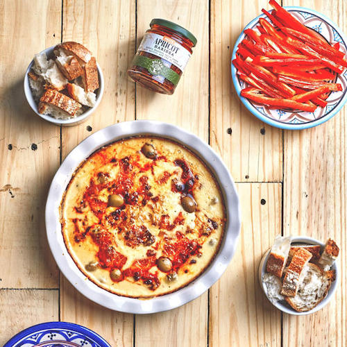 Fondue-style Hot Cheese Dip with Apricot Harissa and Olives – Belazu.com